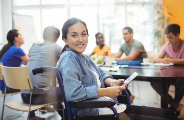 Team members working together in a collaborative workspace